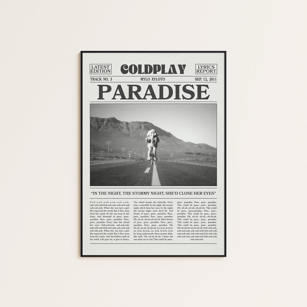 Coldplay Paradise newspaper poster — black frame display