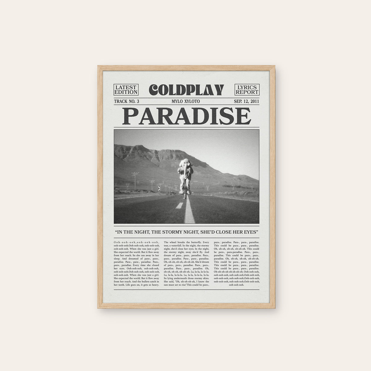 Coldplay Paradise newspaper poster — natural wood frame