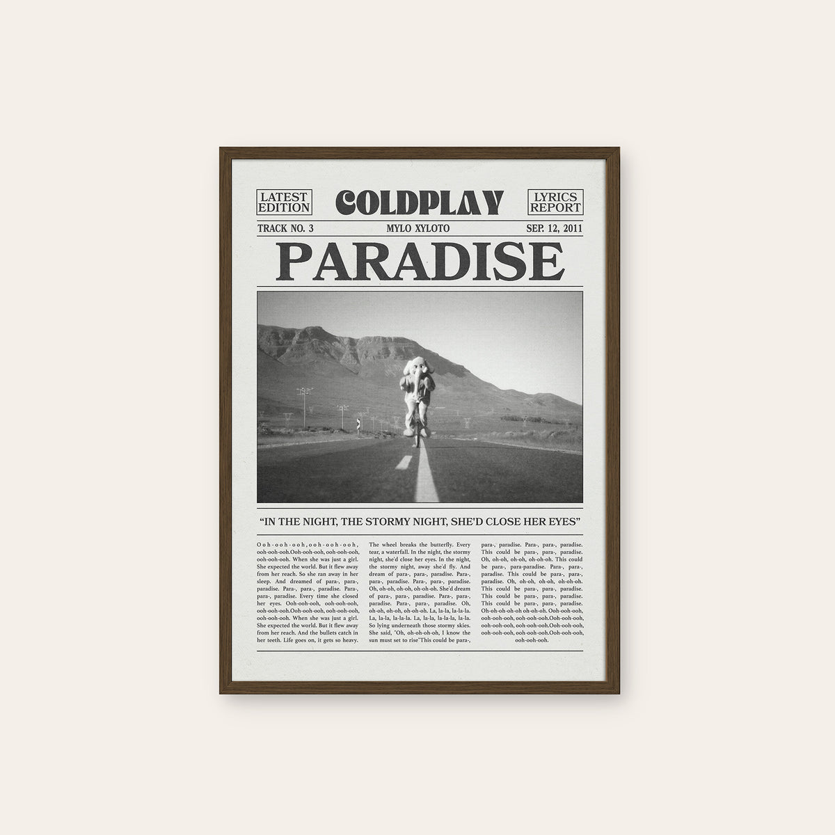 Coldplay Paradise newspaper poster — dark wood frame