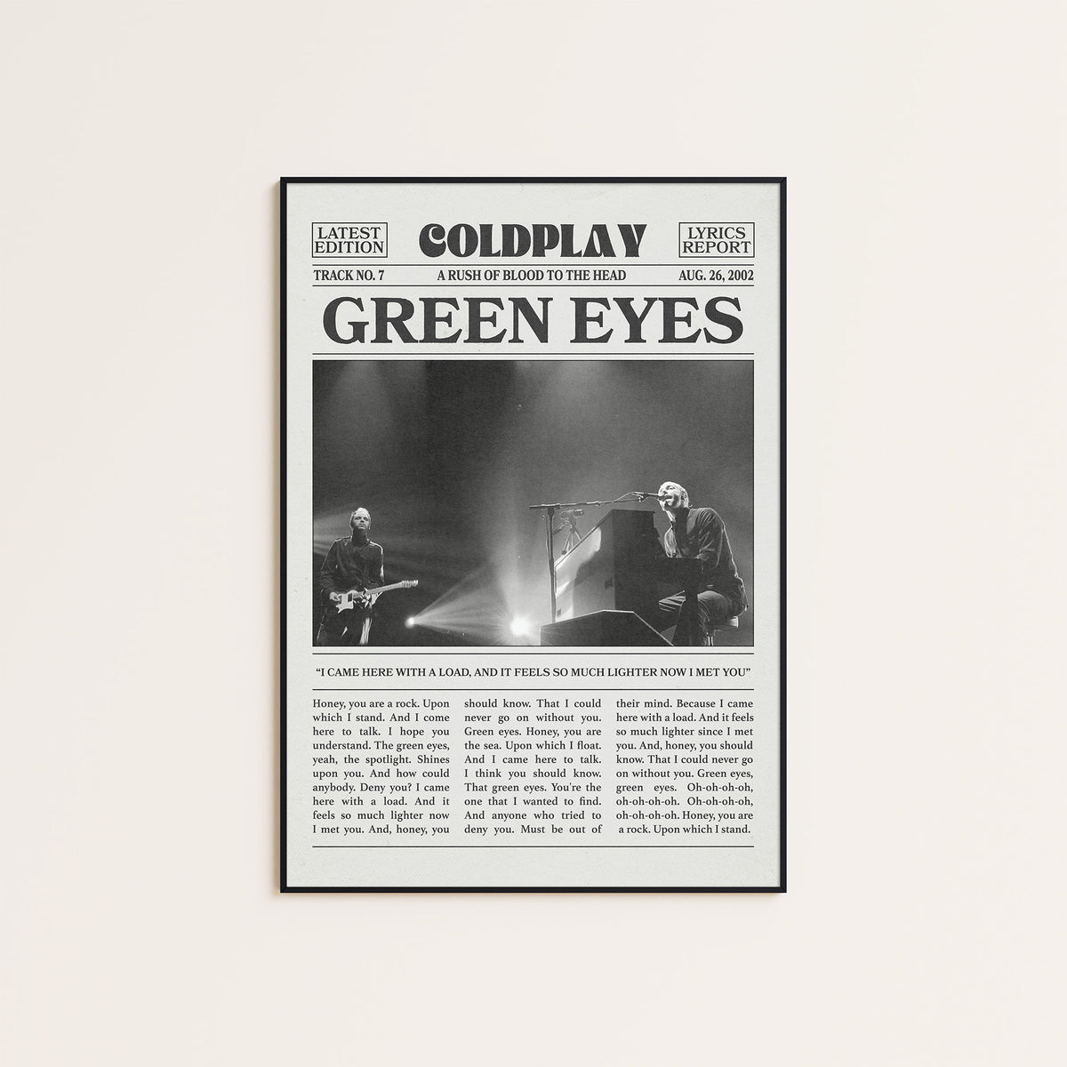 Coldplay Green Eyes newspaper poster — black frame display