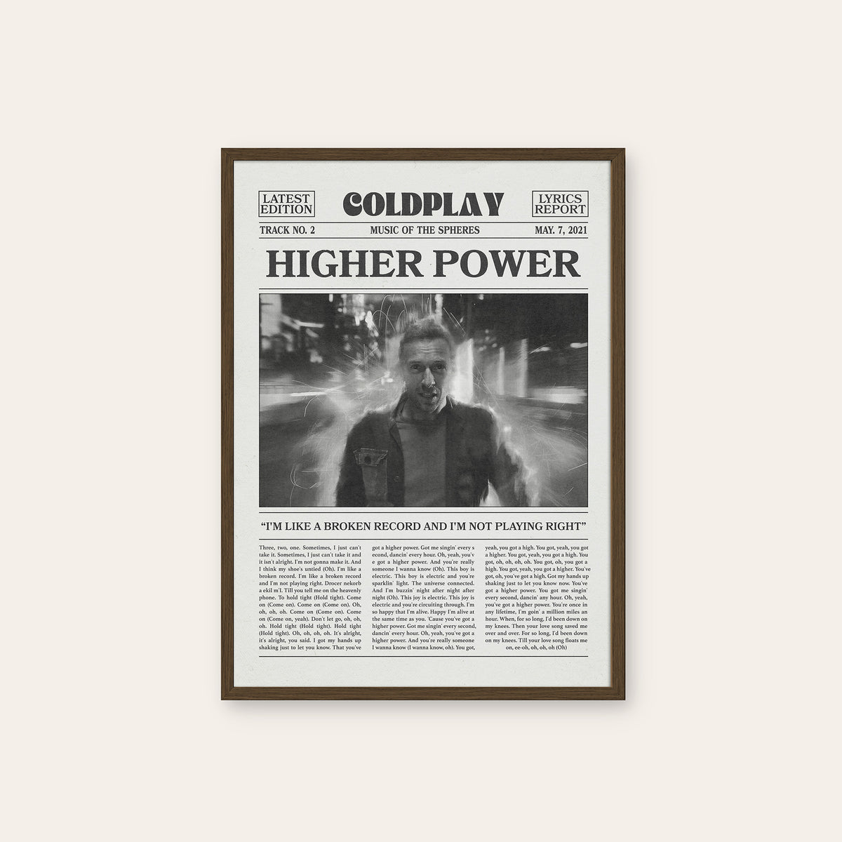 Coldplay Higher Power newspaper poster, B&W Portrait — dark wood frame