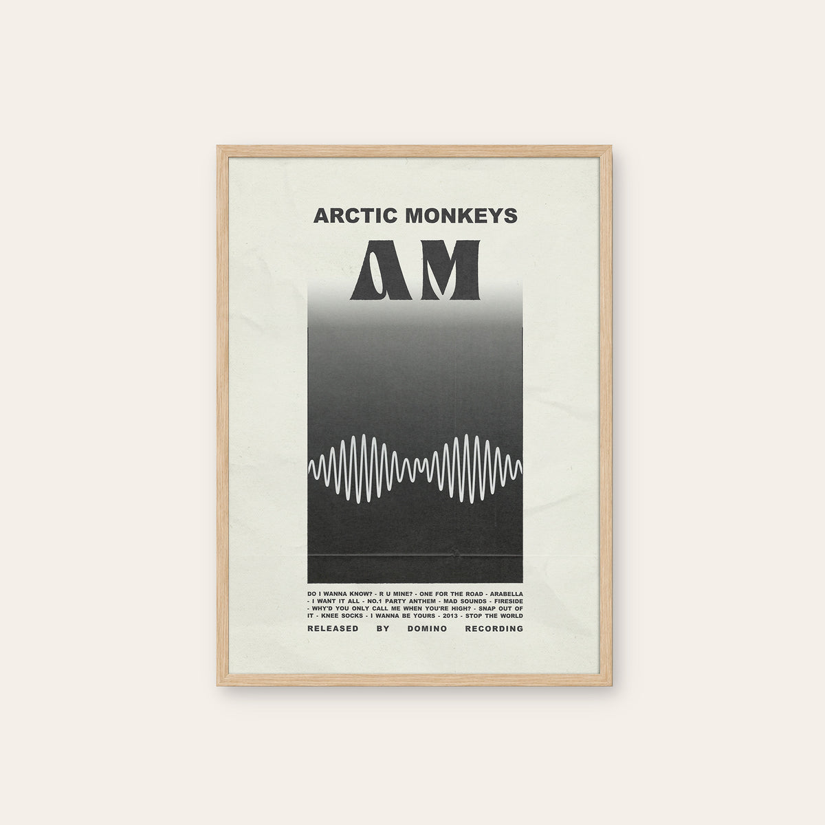 Arctic Monkeys AM newspaper poster — natural wood frame