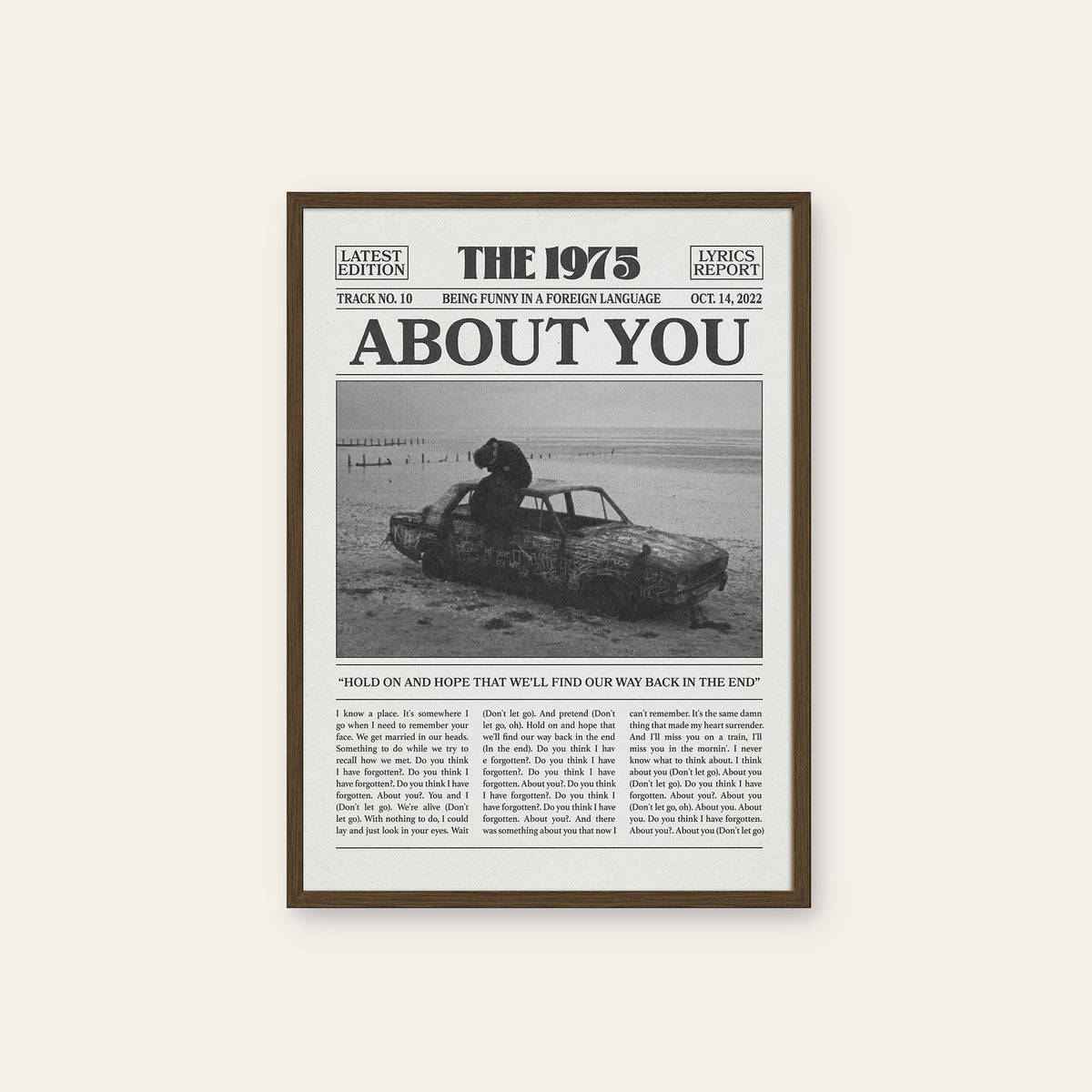 The 1975 About You newspaper poster — dark wood frame