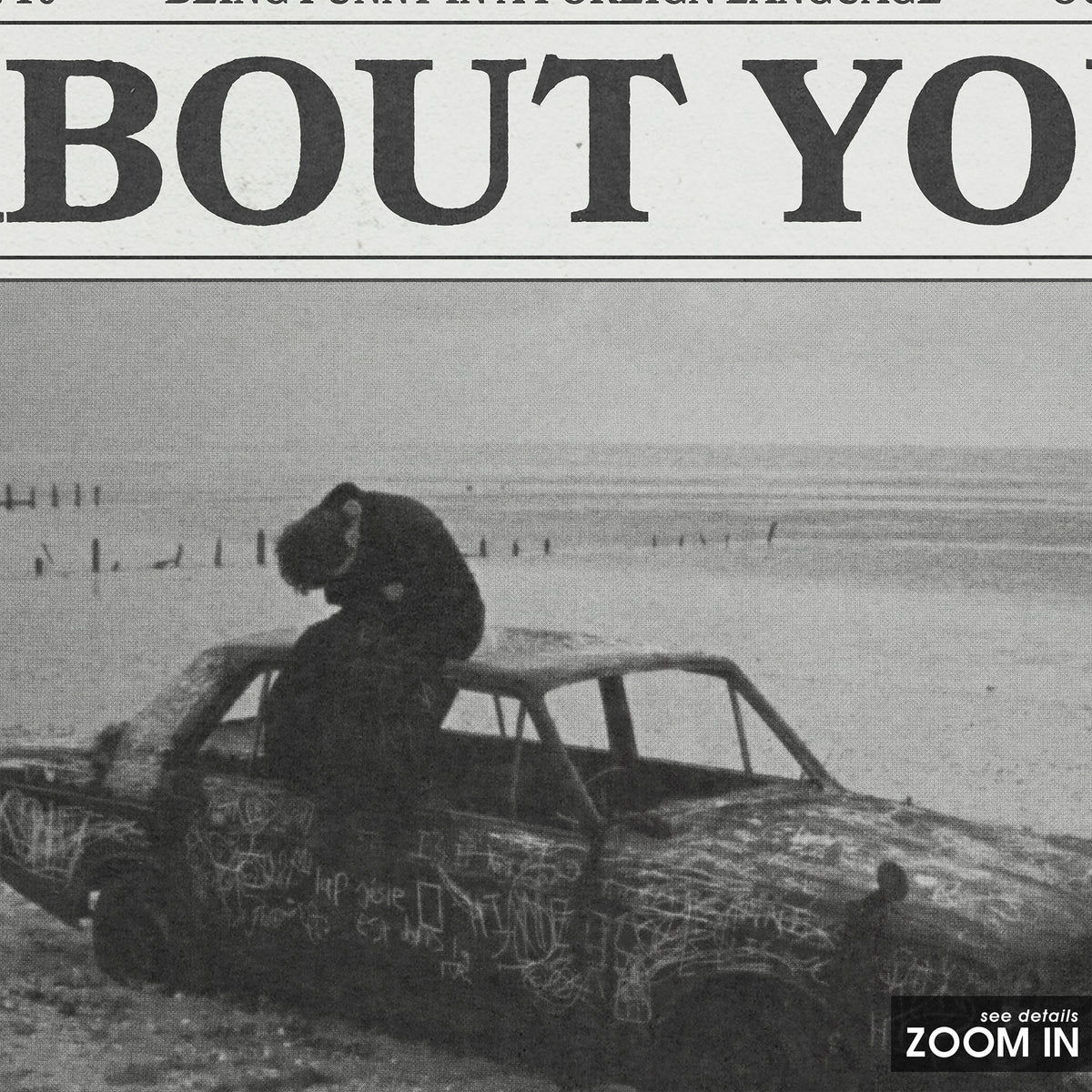 The 1975 About You newspaper poster — close-up detail