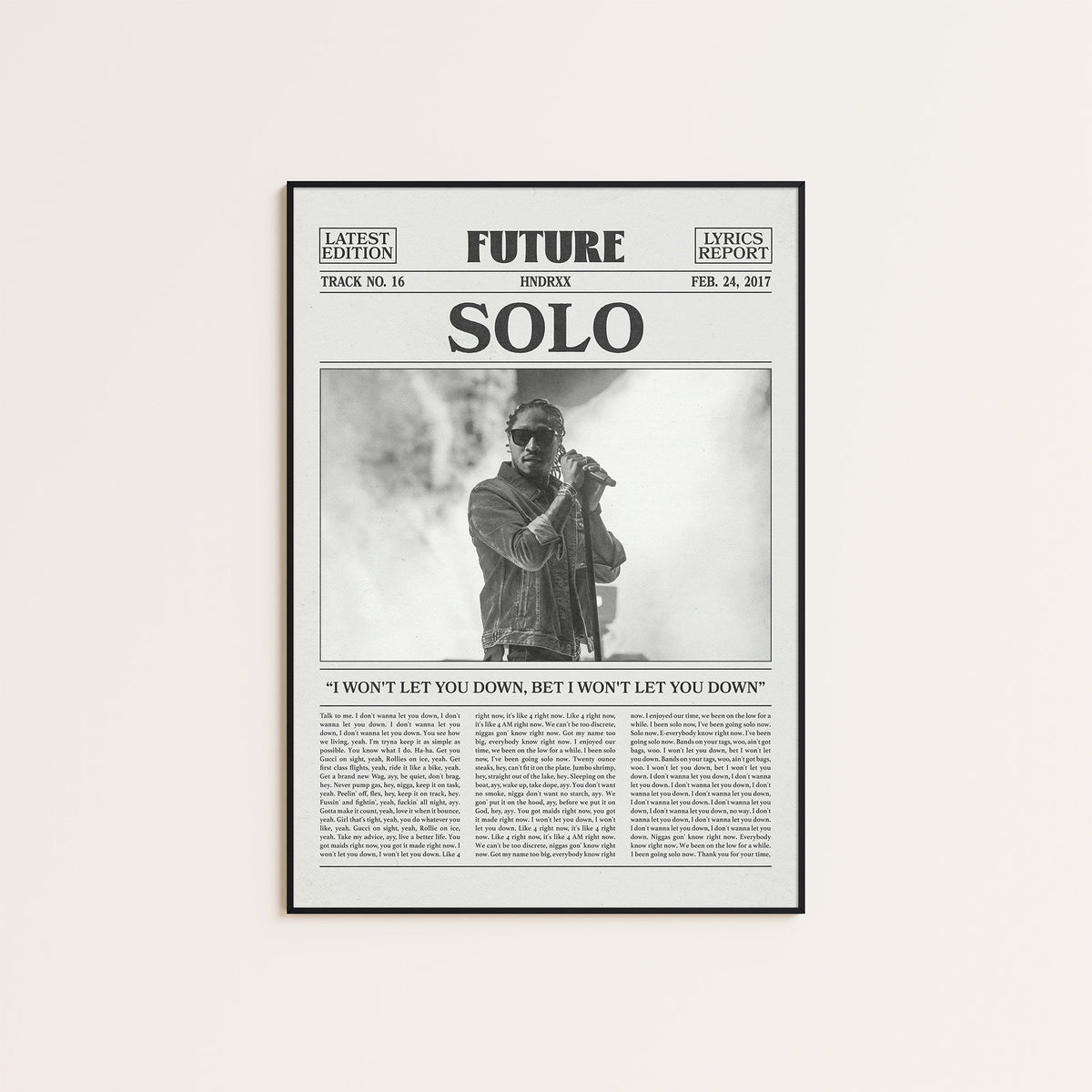 Future Solo newspaper poster — black frame display
