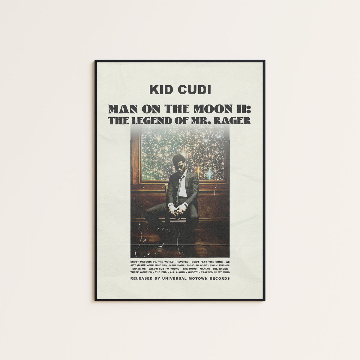 Kid Cudi Man on the Moon II newspaper poster — black frame display