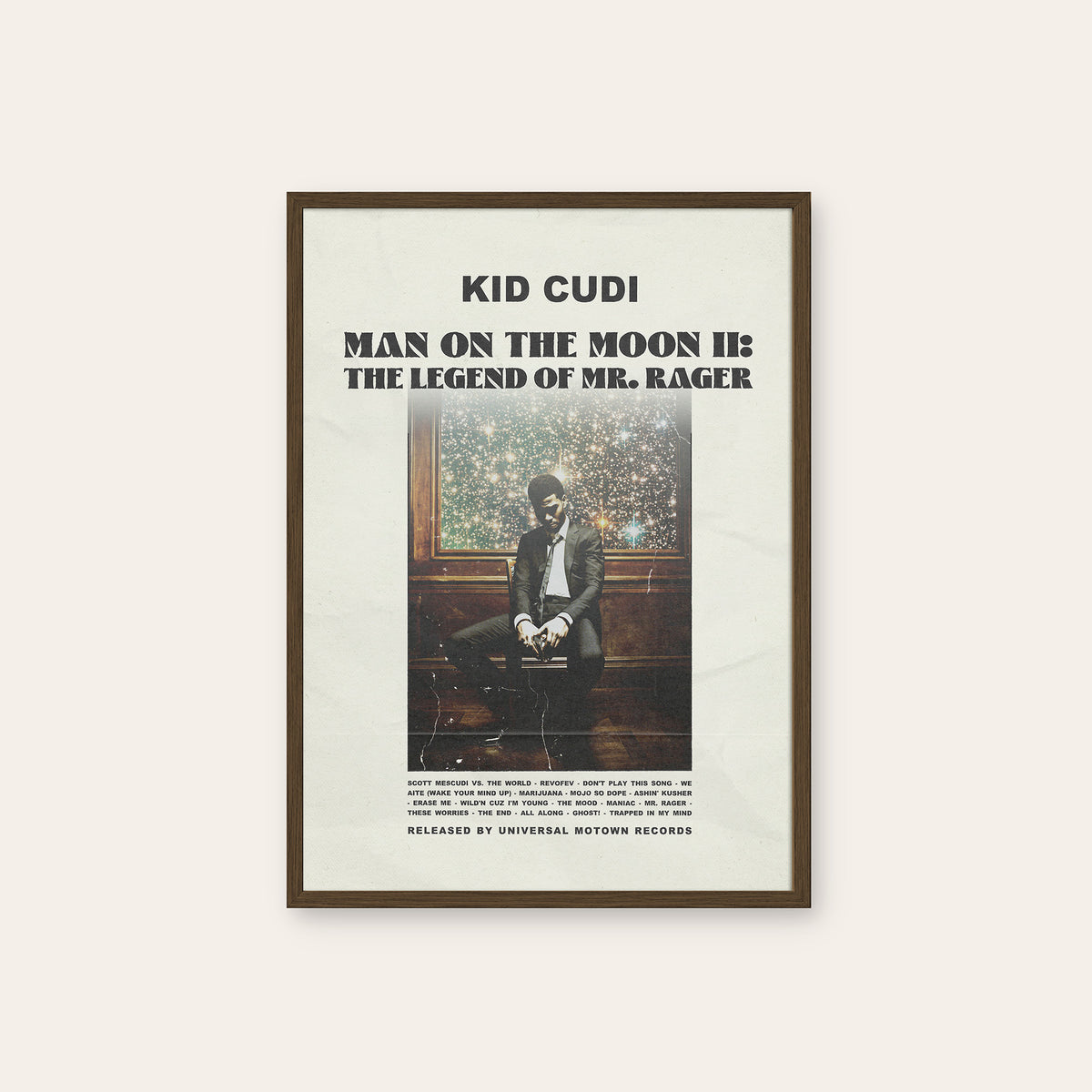 Kid Cudi Man on the Moon II newspaper poster — dark wood frame