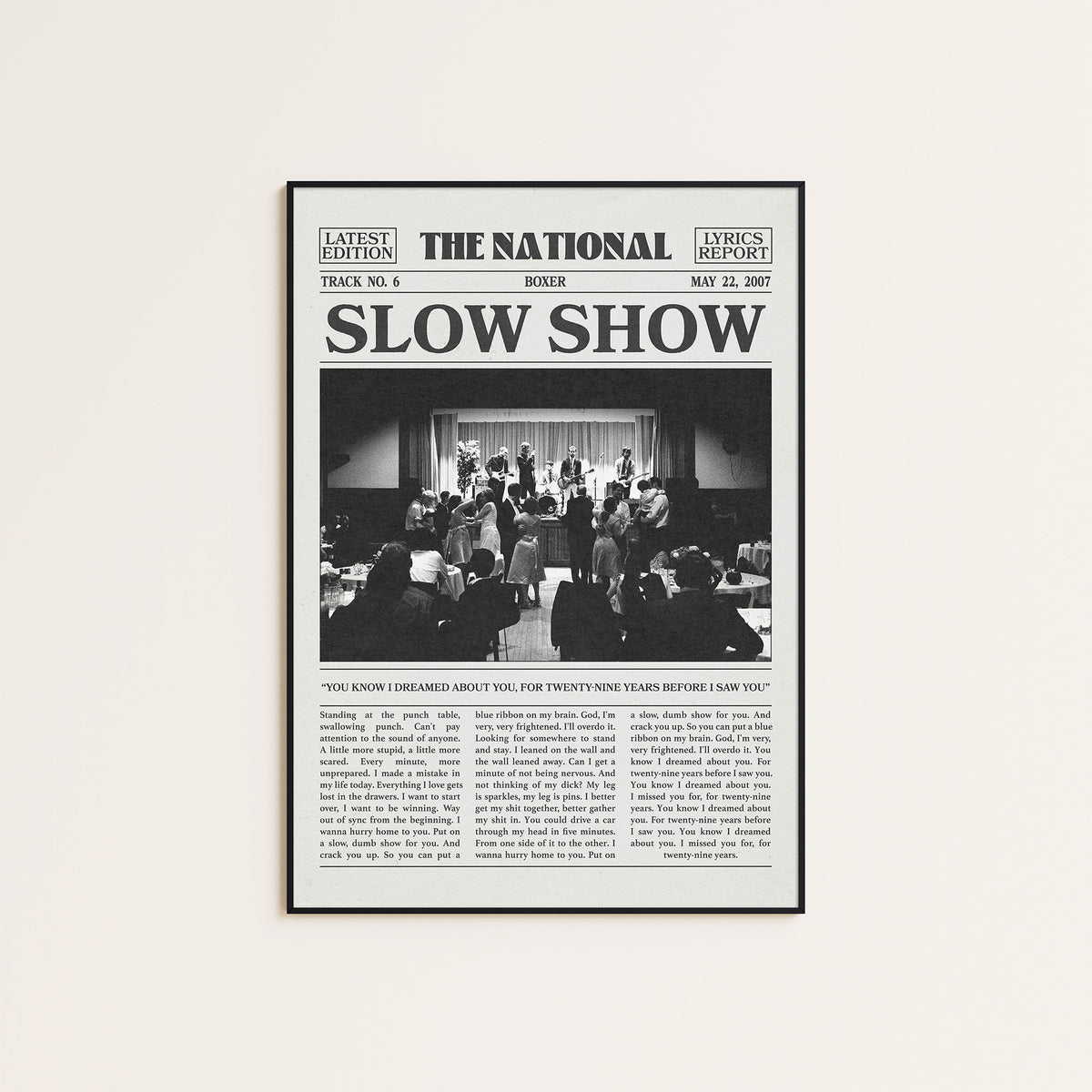 The National Slow Show newspaper poster — black frame display