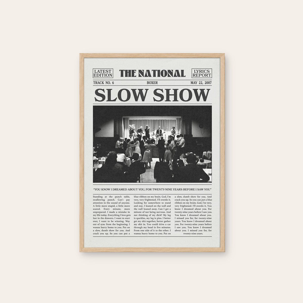 The National Slow Show newspaper poster — natural wood frame