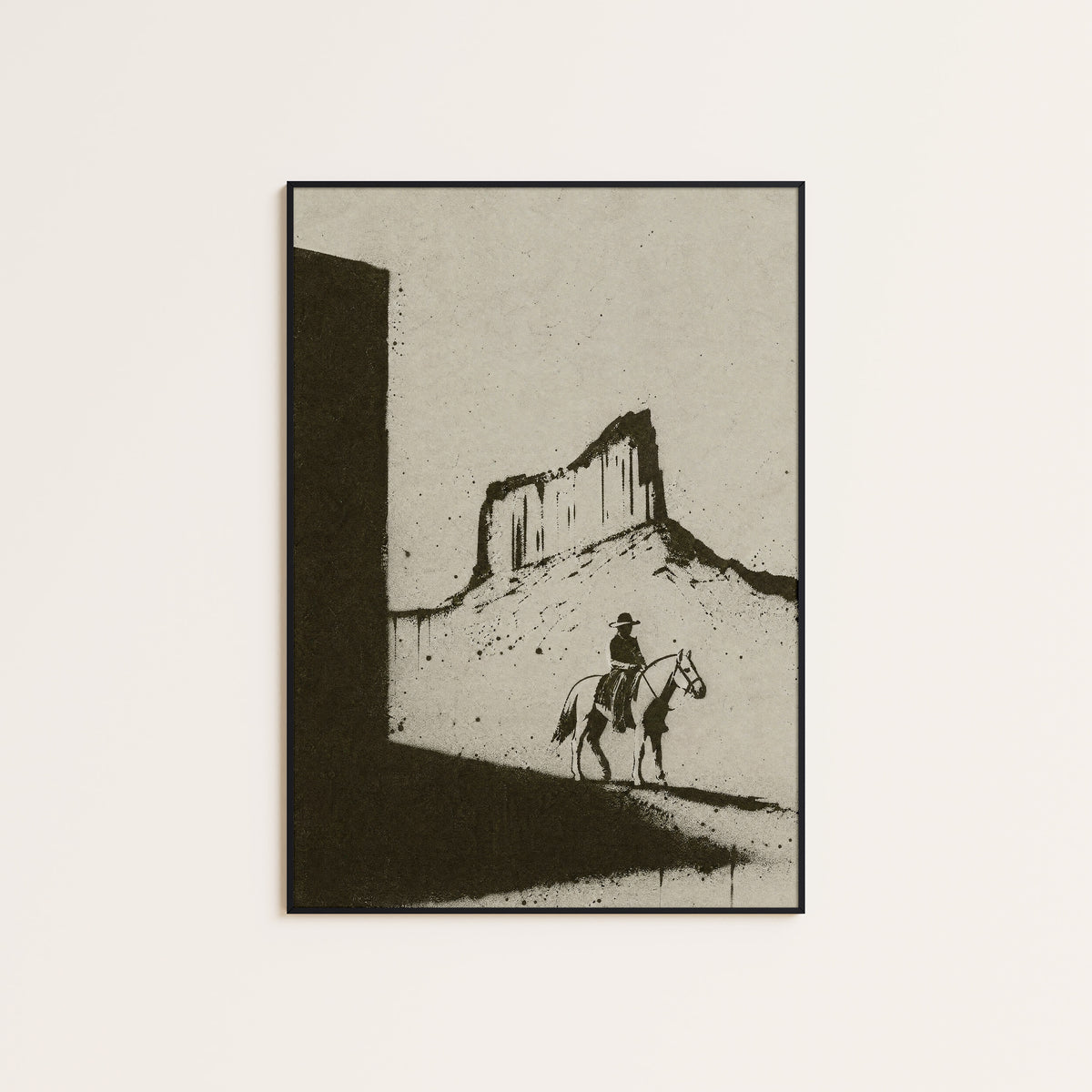 Rider in Monument Valley western print displayed in a slim black frame