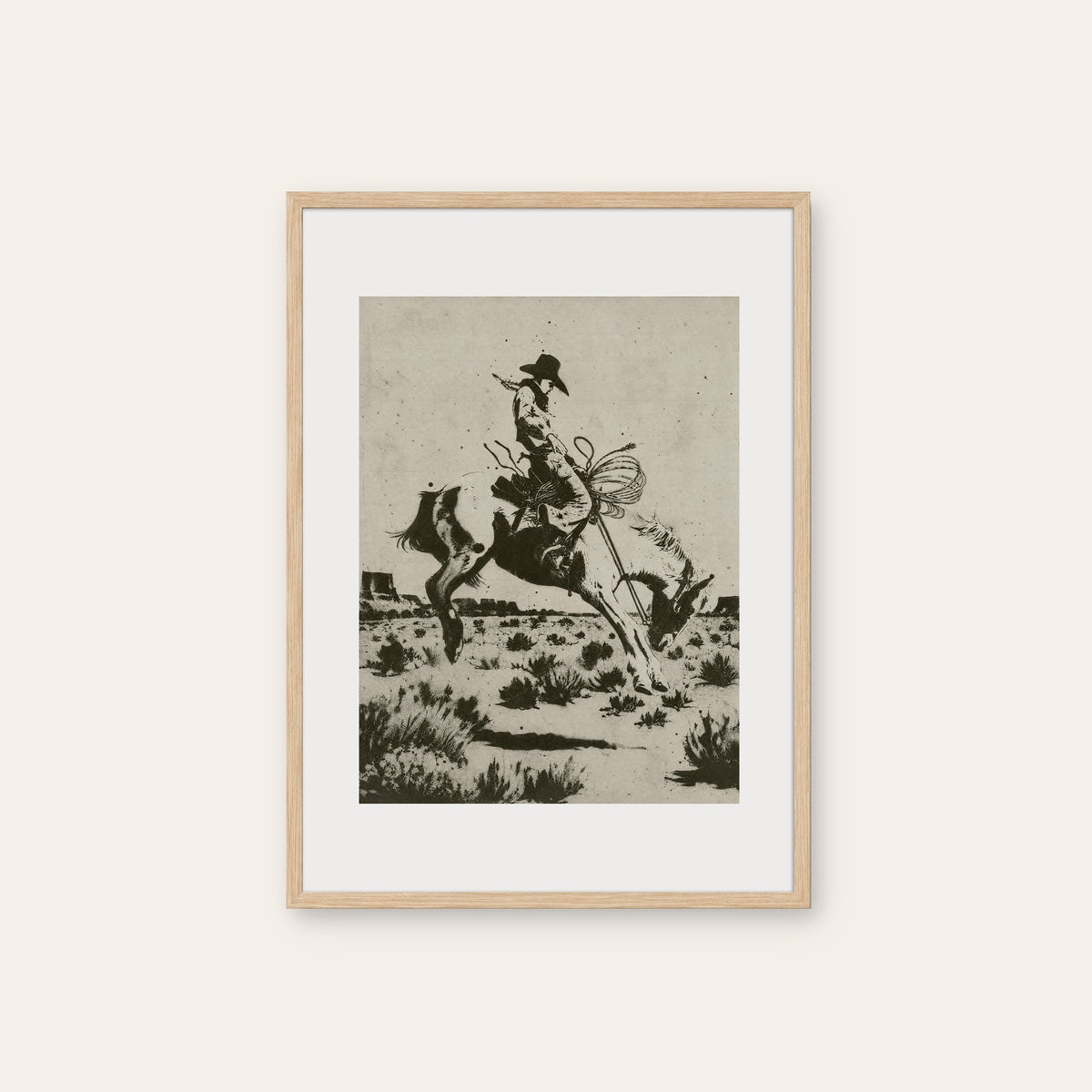 Bucking Bronco II western print in a natural wood frame